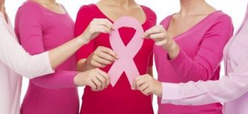 women celebrating Breast Cancer Awareness Month by getting a mammogram