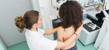 woman getting a mammogram