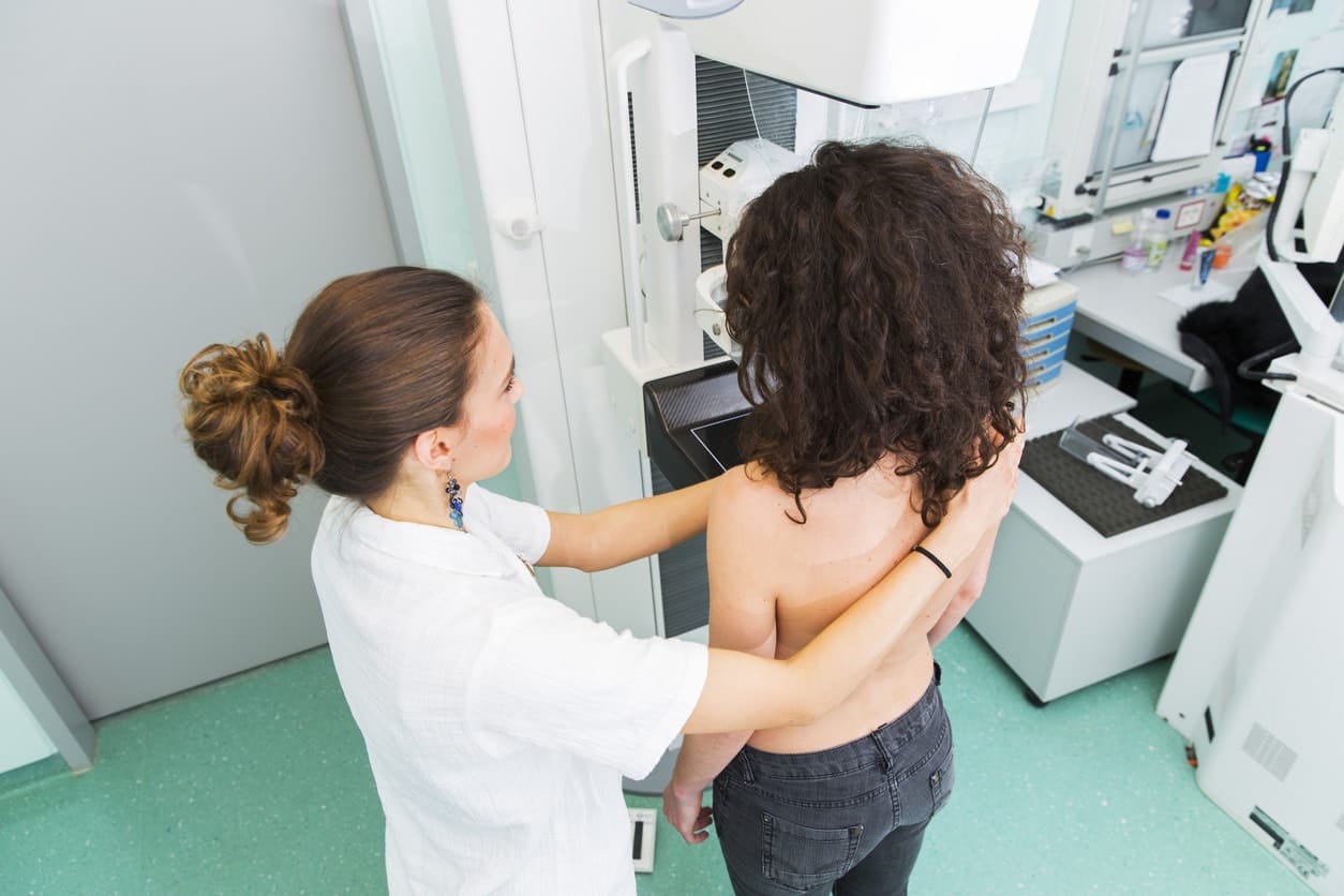 woman getting a mammogram