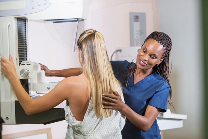 woman getting a mammogram